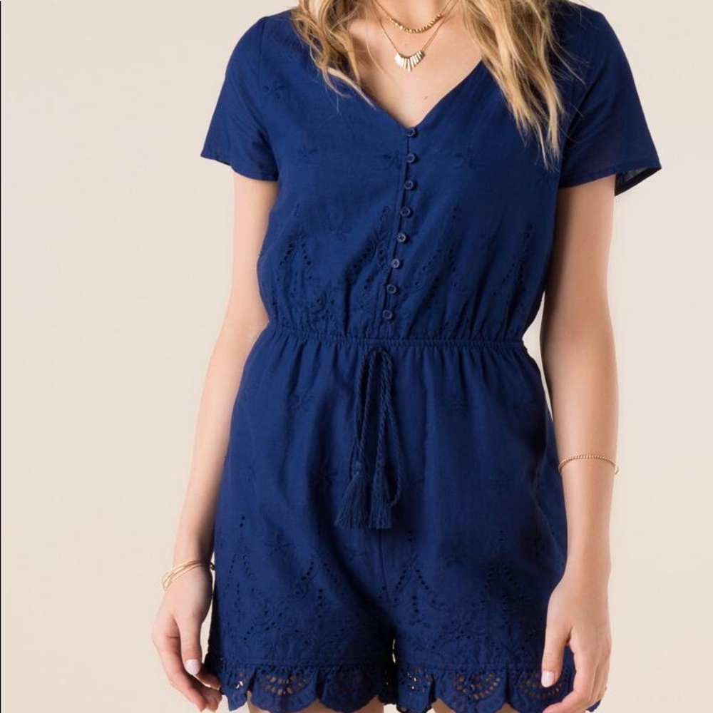 Francesca’s Neila Solid Eyelet Romper”